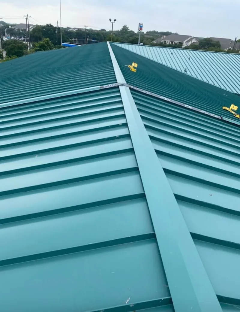 Green commercial metal roof ridge and valley for Metal Roof Repair in Great Barrington